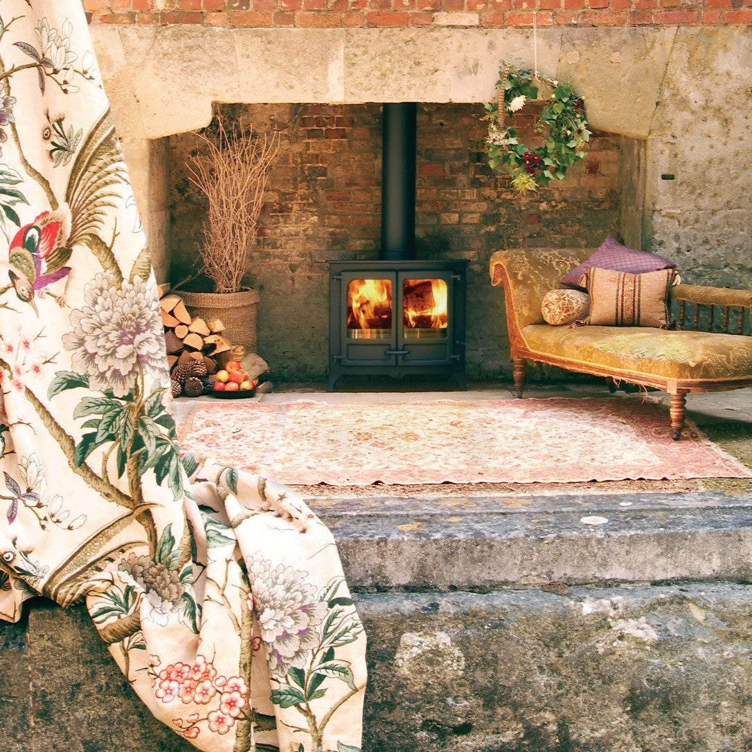 What are the advantages of a wood burning stove?